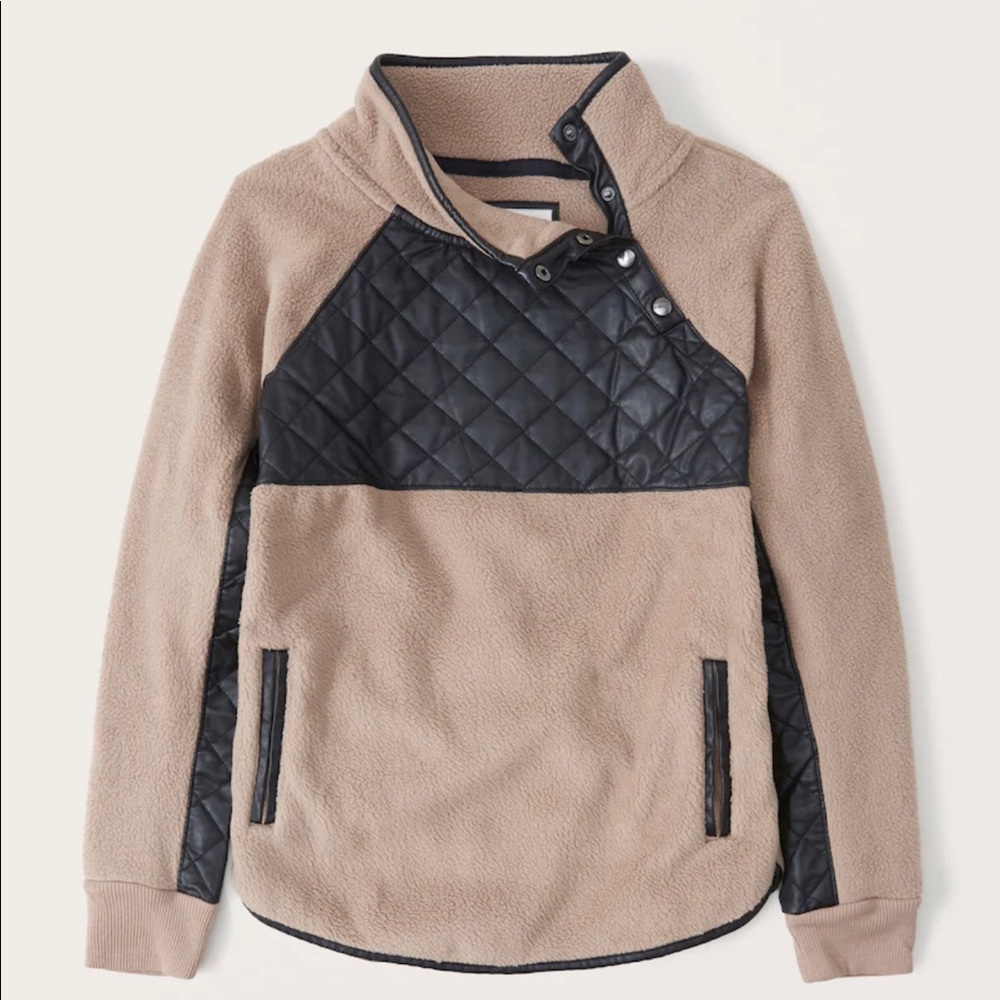 Woman’s asymmetrical fleece size Small NWT.